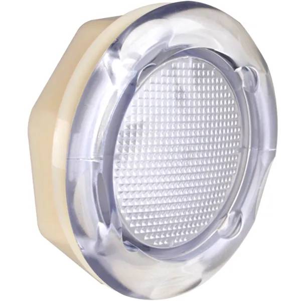 Lamparmatur 5" sedd snett framifrån med räfflad genomskinlig lins och beige ram runt kanten.